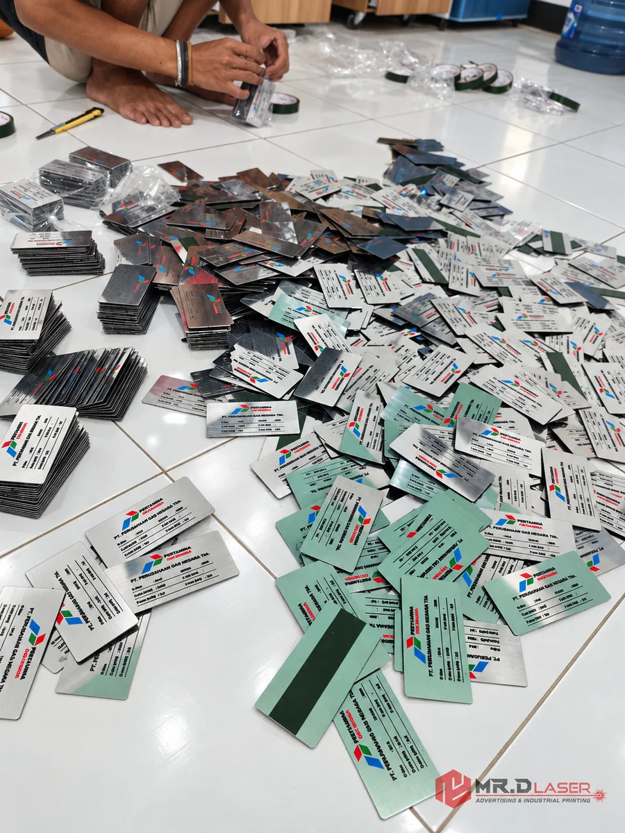 A real MR.D LASER production batch of industrial metal nameplates